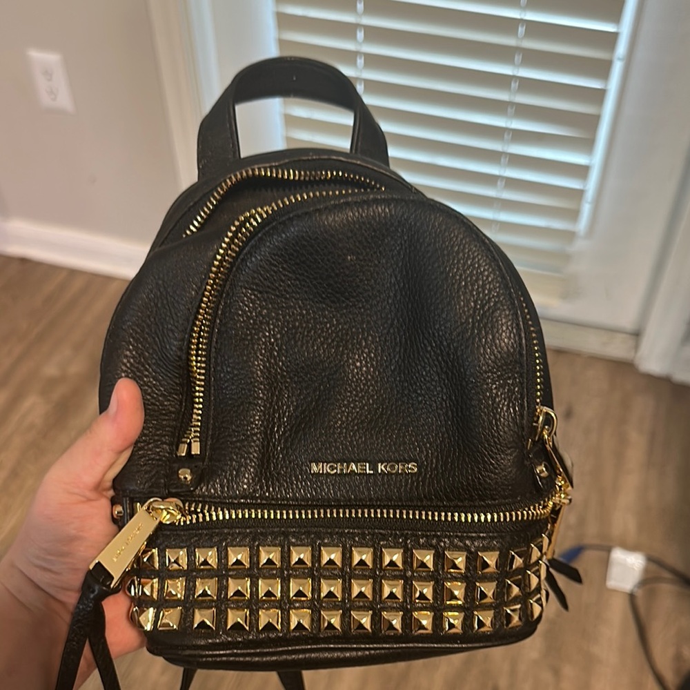 Michael Kors Black and Gold Leather Backpack